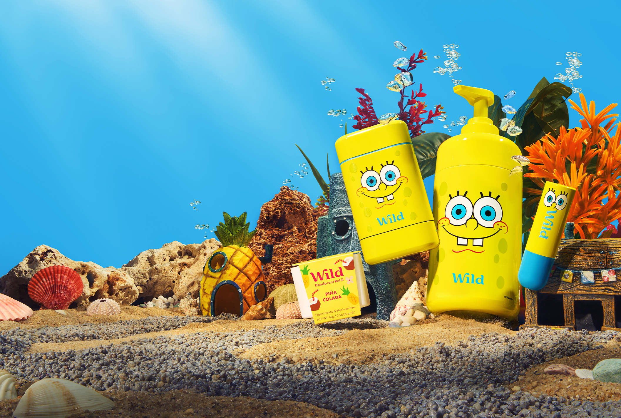 Caption: a couple of yellow containers sitting on top of a sandy beach