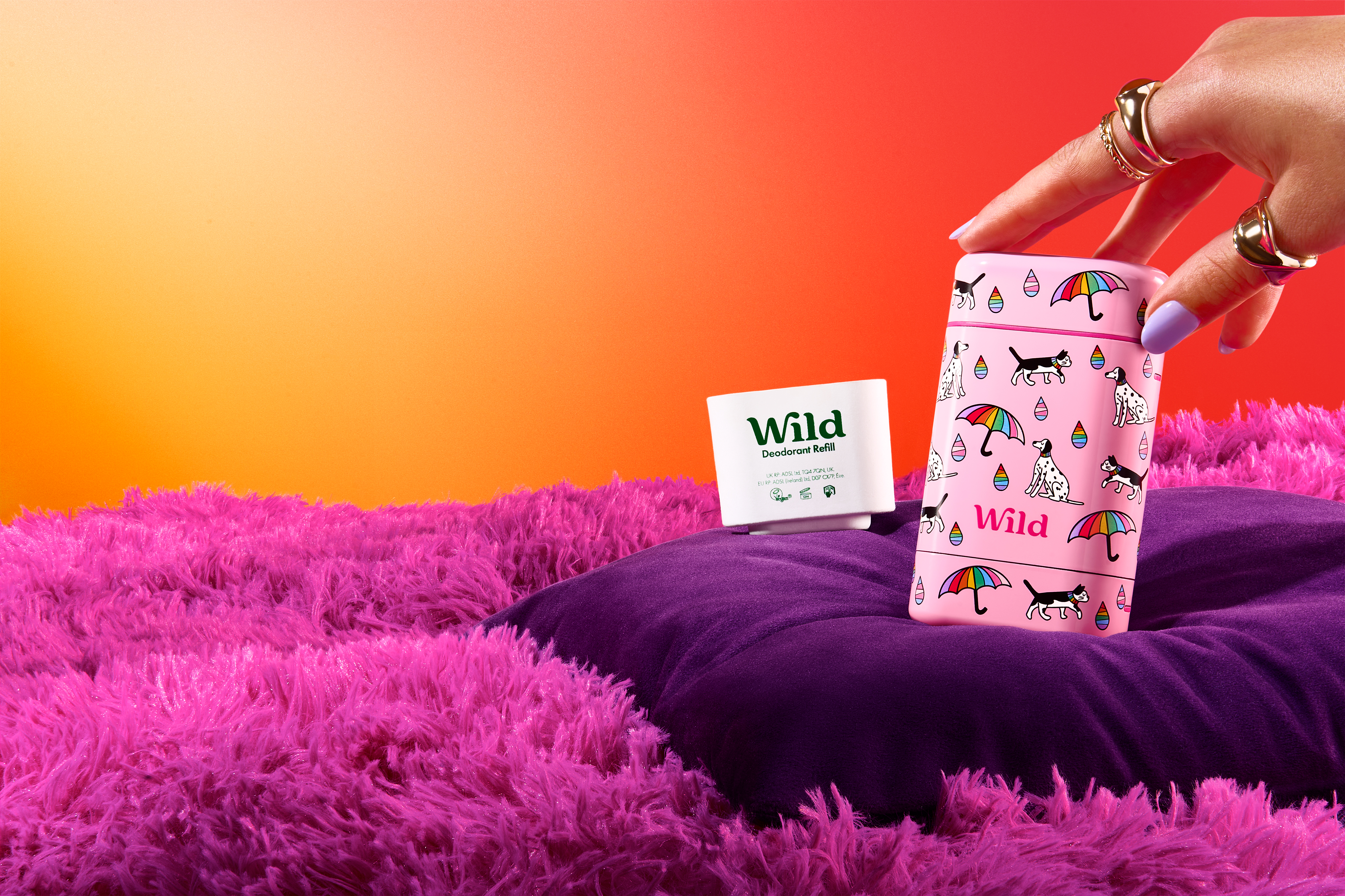 Caption: a woman's hand reaching into a pink bag
