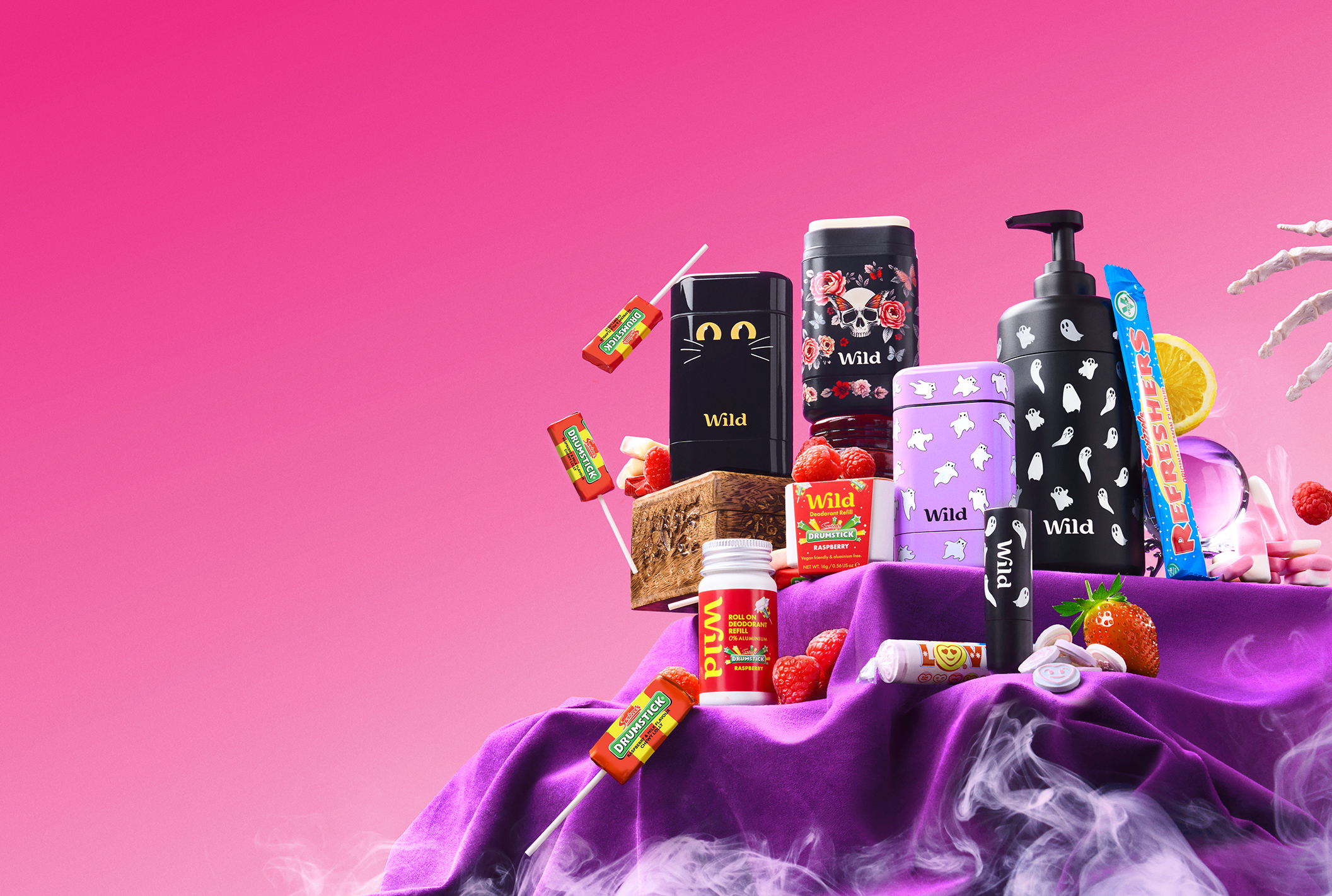 Caption: a pink background with a variety of items on it