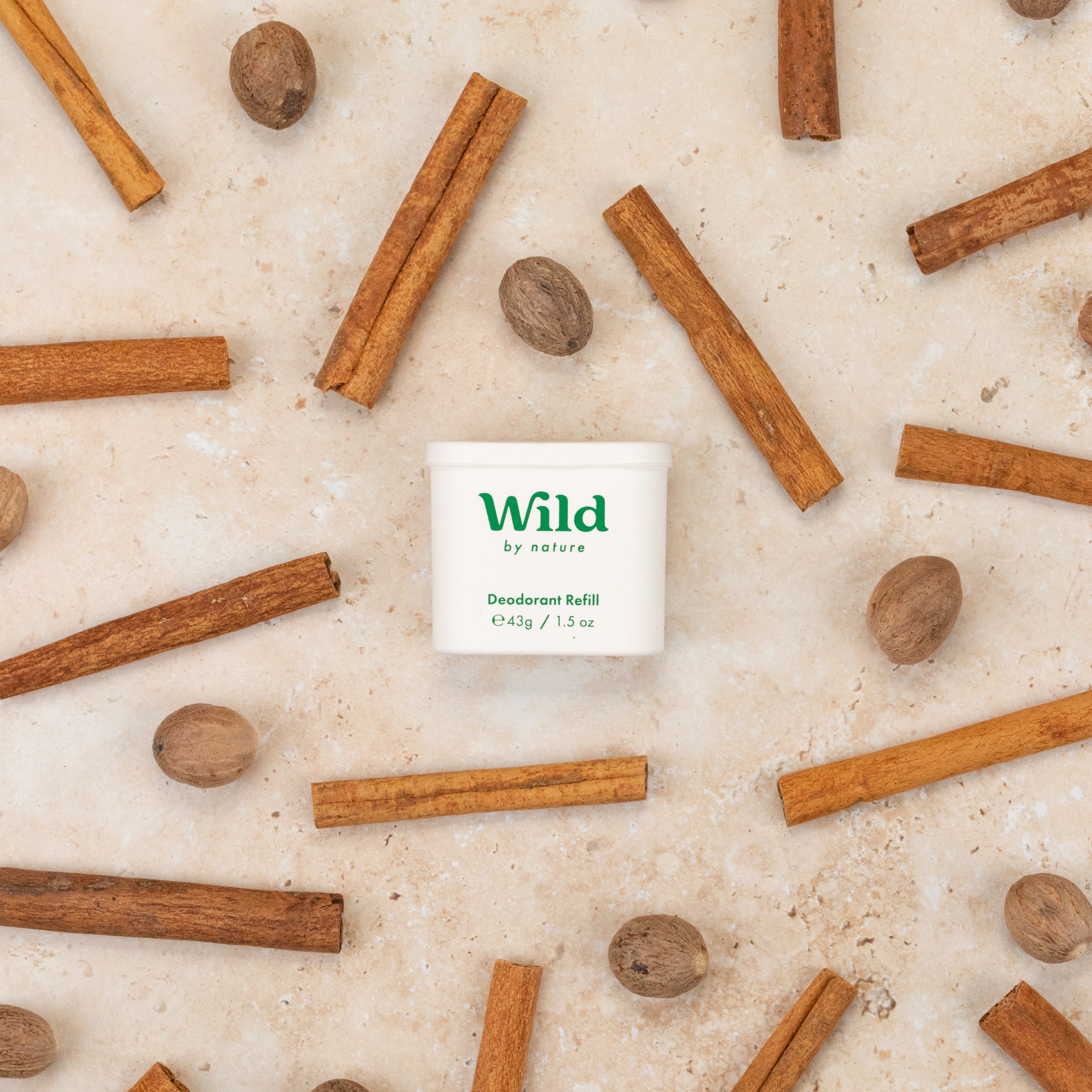 Caption: a box of cinnamons sitting on top of a table