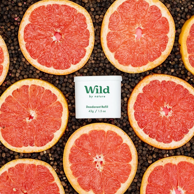 Caption: a bunch of grapefruits sitting on top of a table