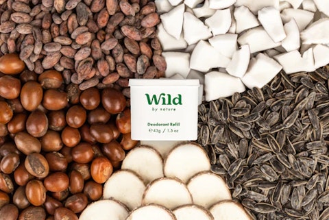 Caption: a variety of nuts and seeds with a sign that reads wild