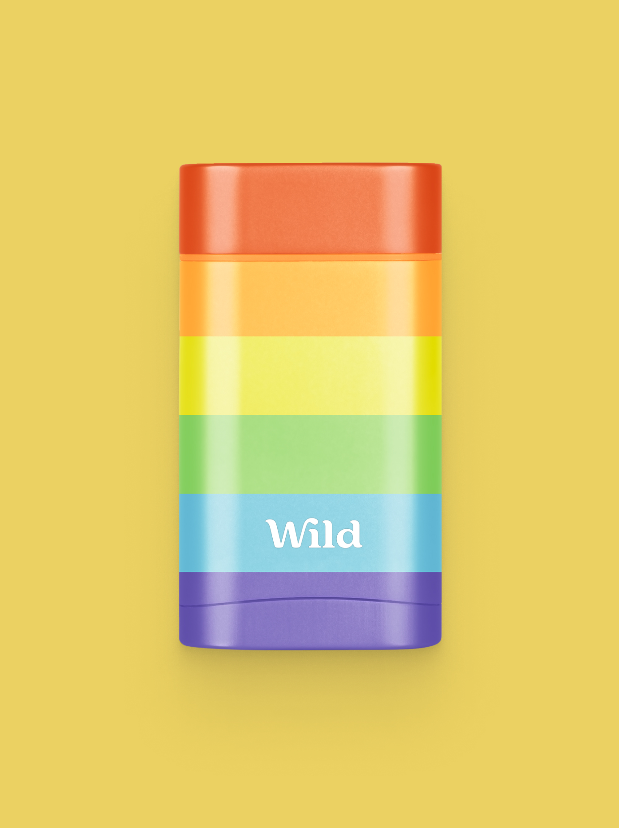 Légende : une tasse à café arc-en-ciel avec le mot "wild" dessus