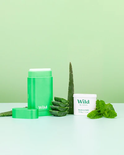 Caption: a couple of green items sitting on top of a table