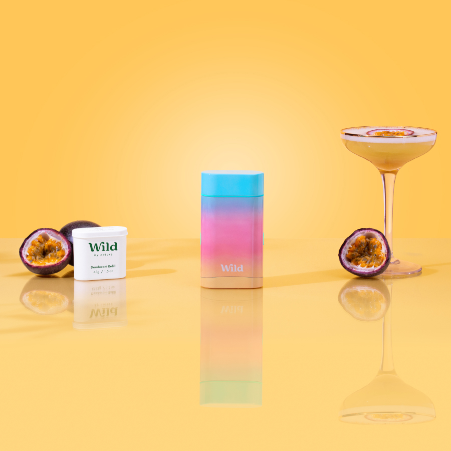 Caption: a glass of wine next to a bottle of wine