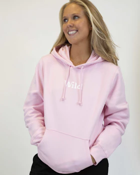 Caption: a woman wearing a pink hoodie with the word mom printed on it