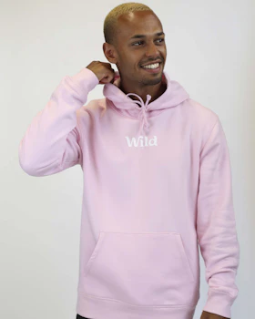Caption: a man wearing a pink hoodie with the word wind on it
