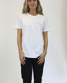 Caption: a woman standing in front of a white background