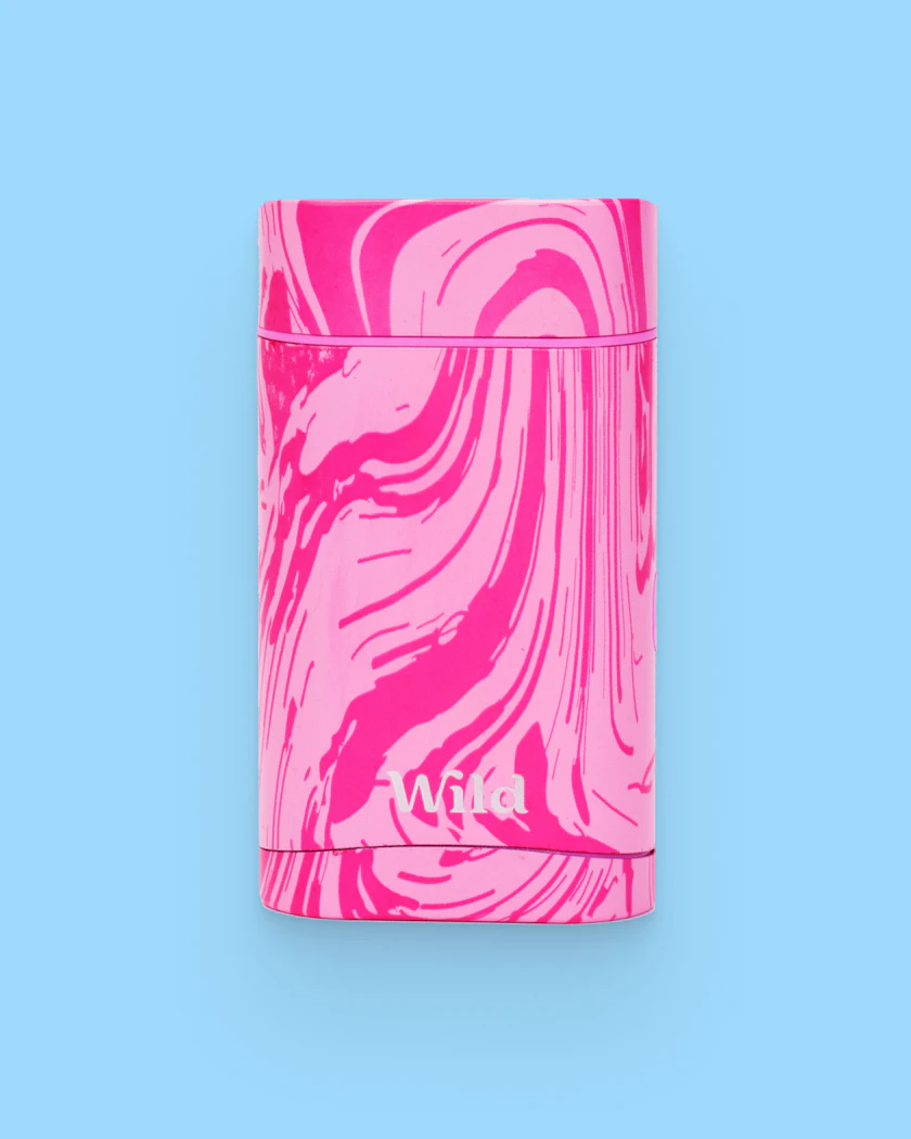 Caption: a pink and white tube on a blue background