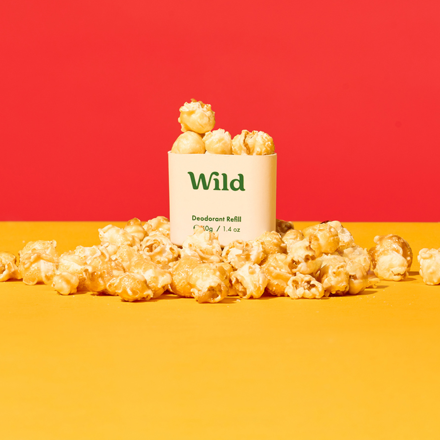 Caption: a can of wild popcorn sitting on a table