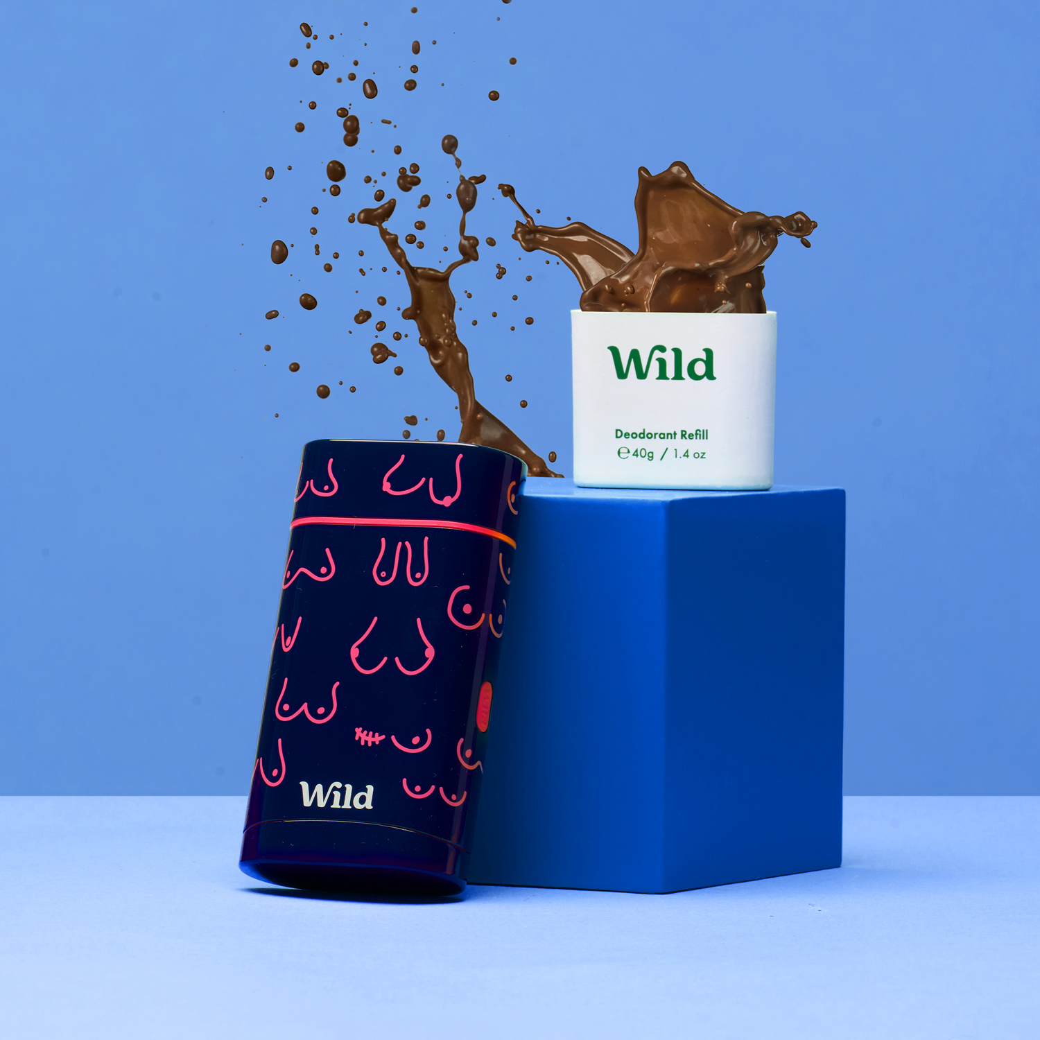 Caption: a blue box with chocolate splashing out of it