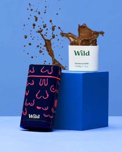 Caption: a blue box with chocolate splashing out of it