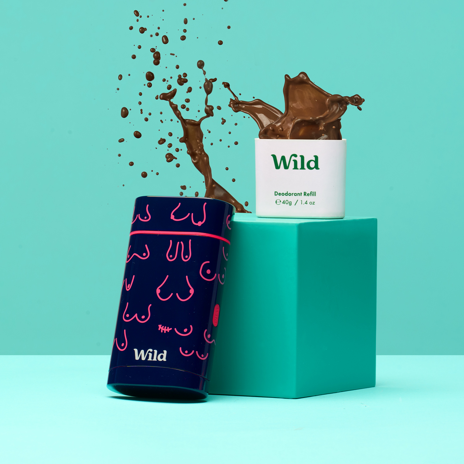 Caption: a blue box with a chocolate splash coming out of it