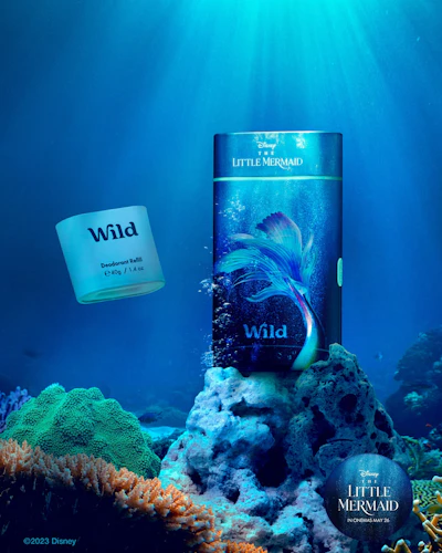 Caption: a cell phone sitting on top of a coral under water