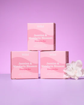 Caption: three soap bars sitting on top of each other