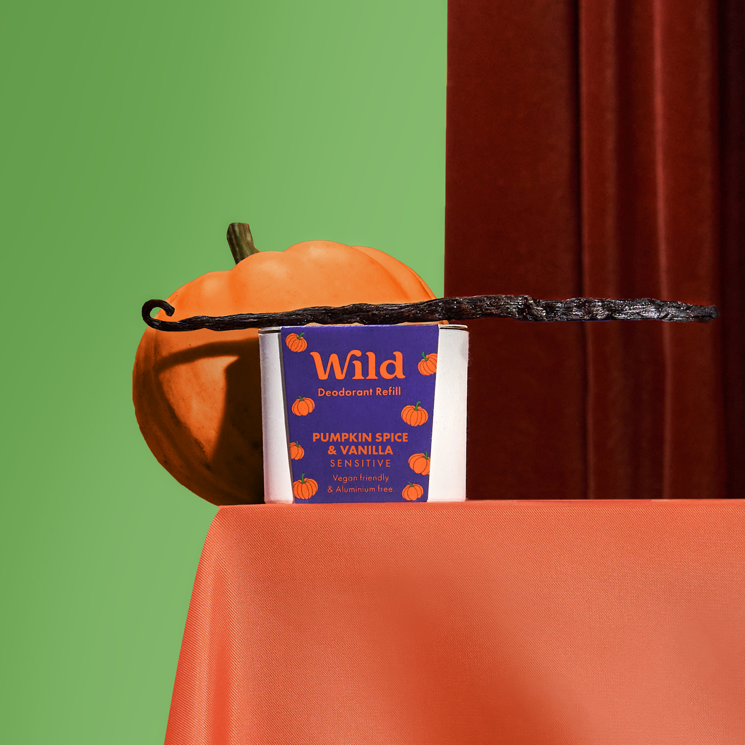 Caption: an orange pumpkin sitting on top of a table