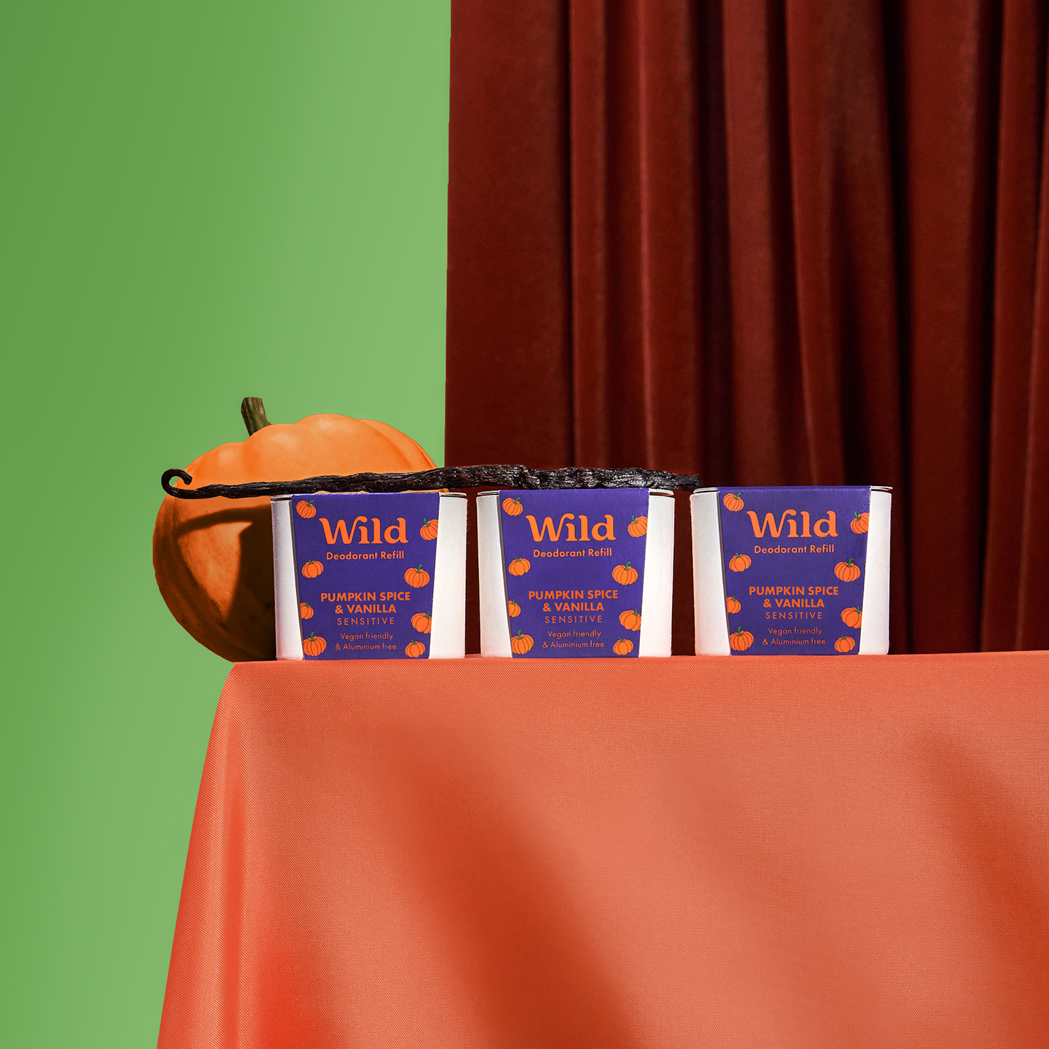 Caption: three boxes of wild are sitting on a table