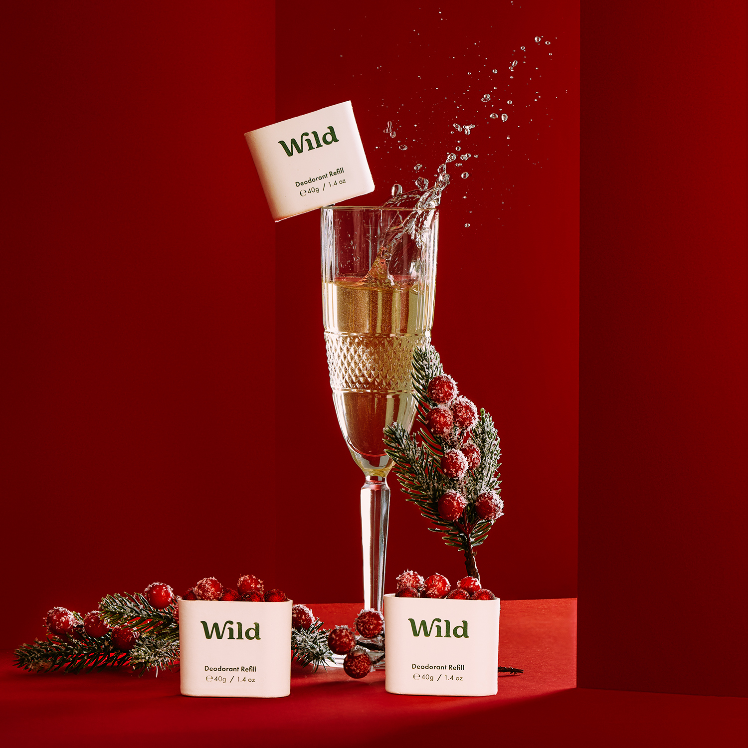 Caption: a glass of wine with a splash of water on top of it