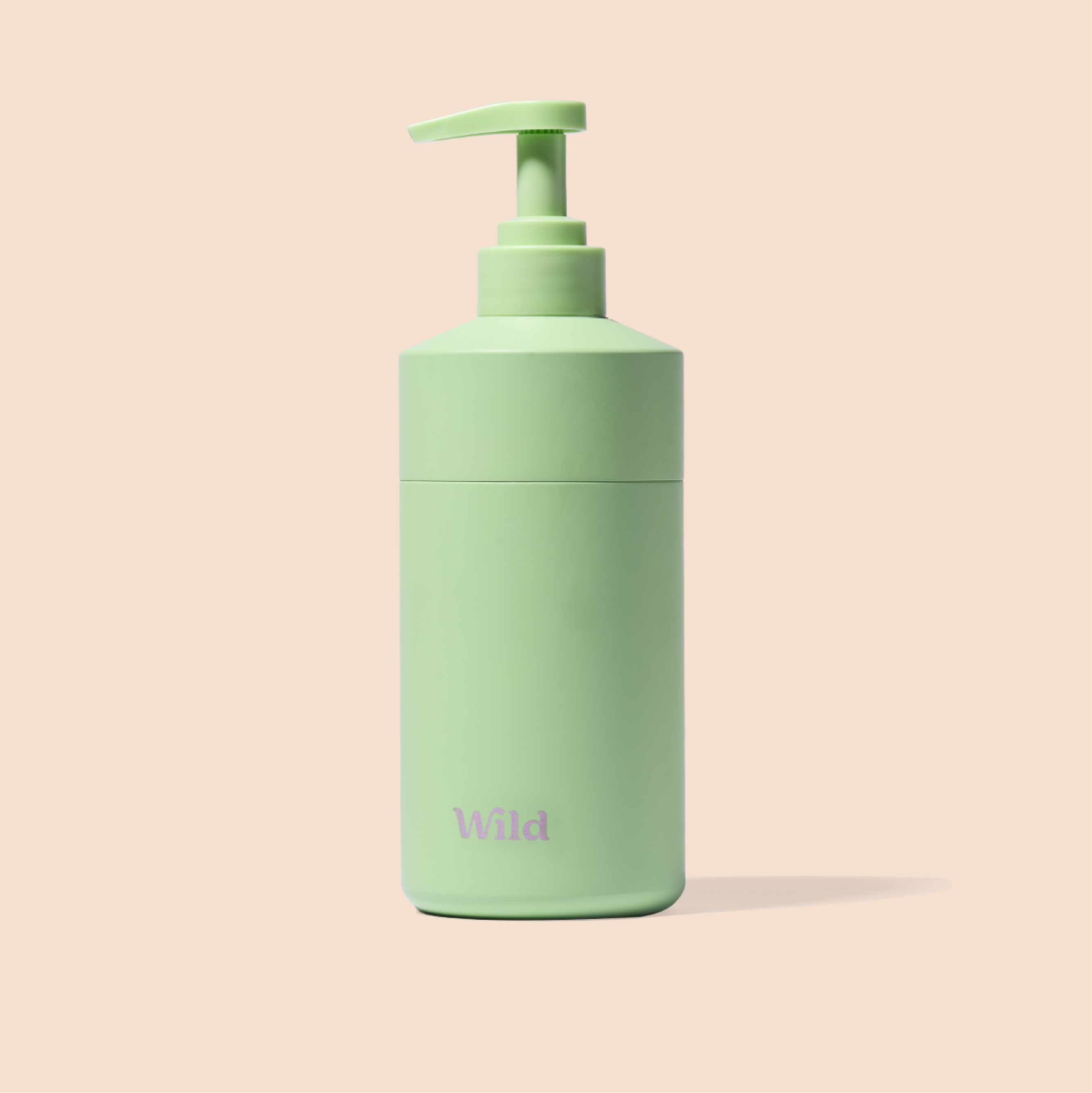 Caption: a green bottle with a pump on top of it