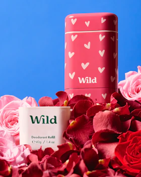 Caption: a cup of wild deodorant next to a tin of wild deod
