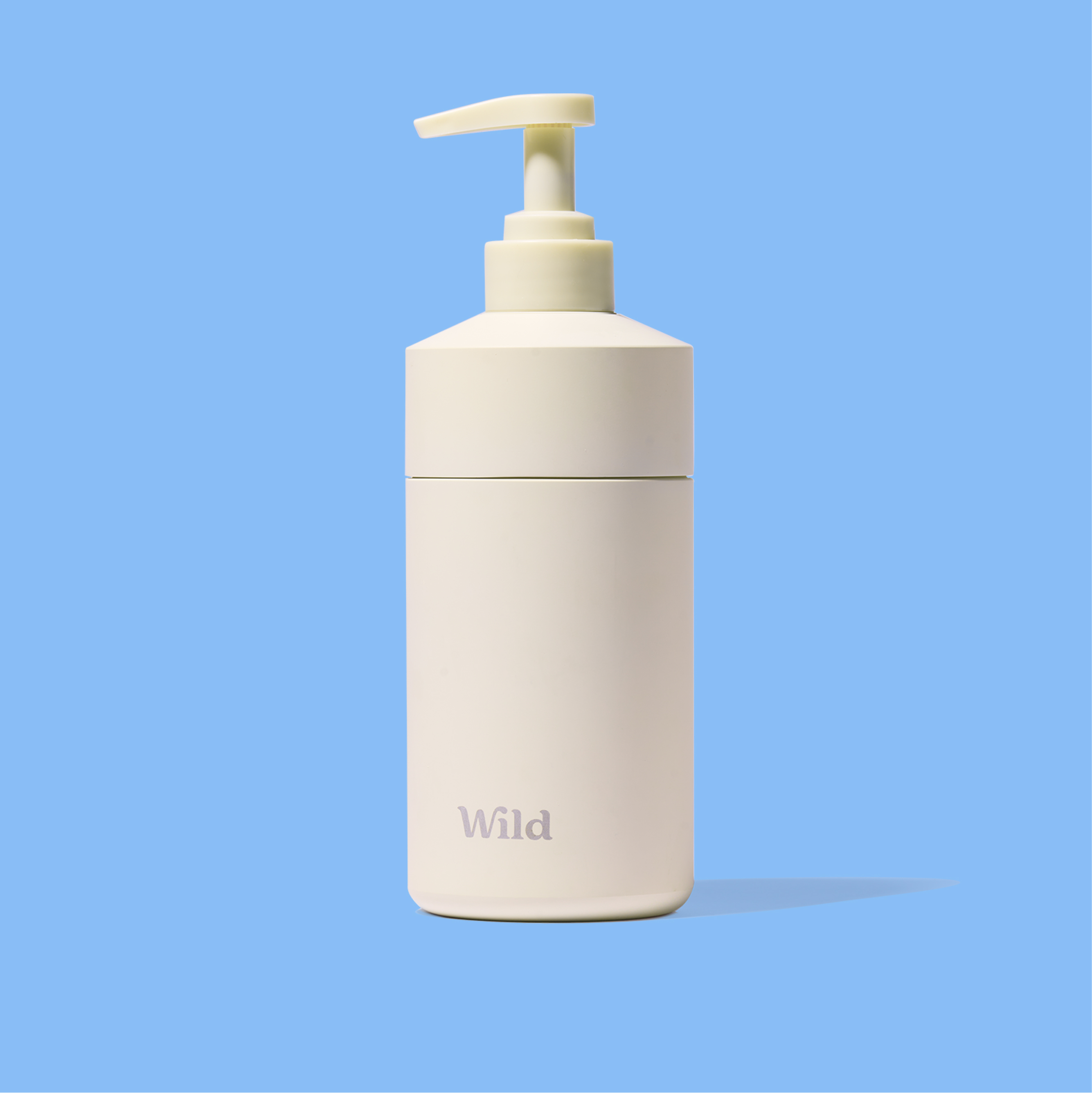 Caption: a white bottle with a pump on a blue background