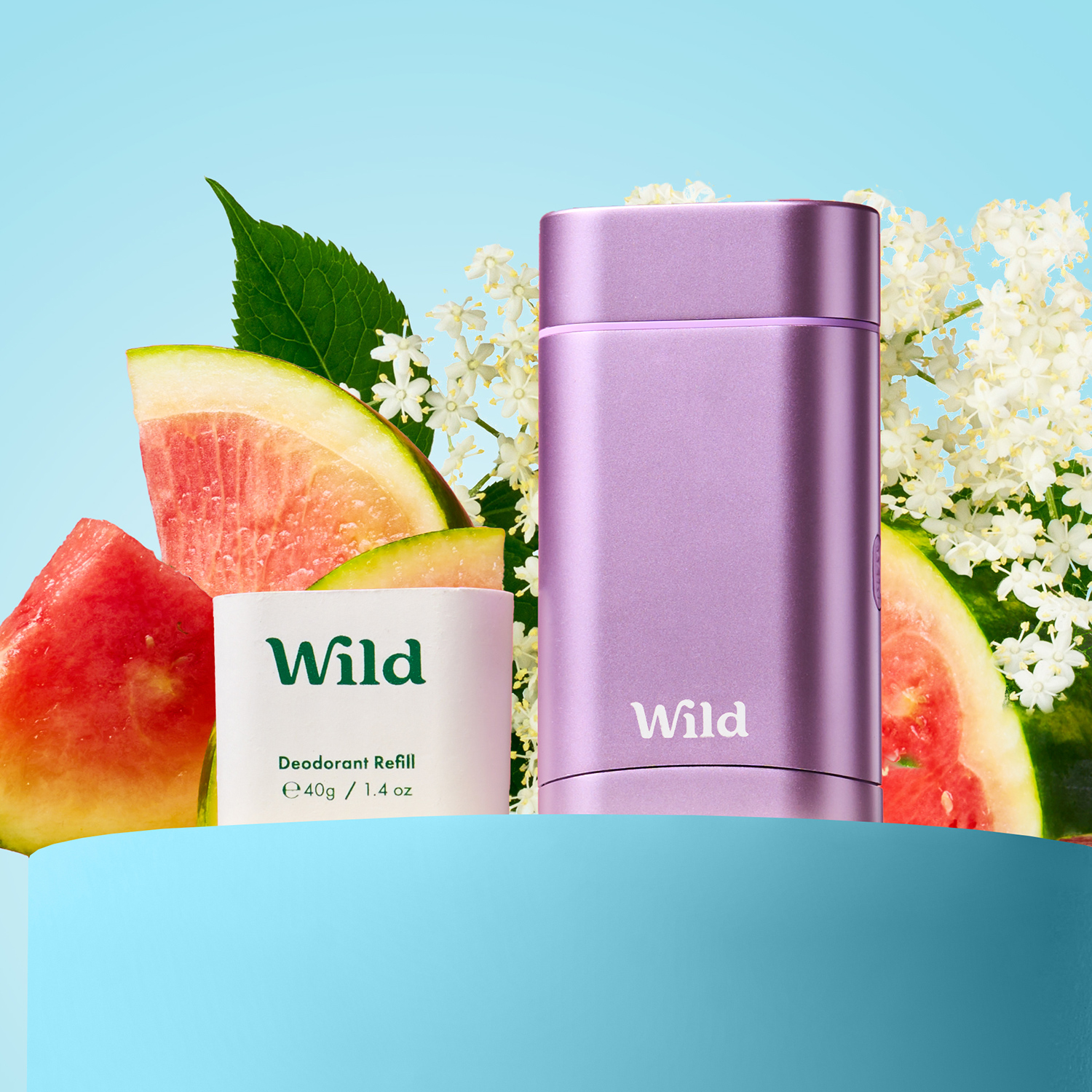 Caption: a bottle of wild next to a bunch of fruit