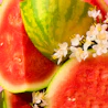 Caption: a bunch of watermelon slices with flowers on them