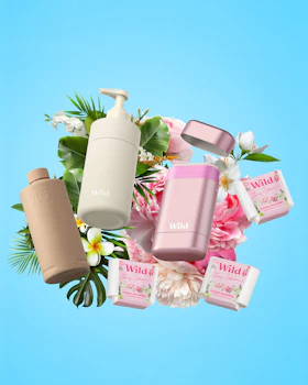 Caption: a bunch of different types of cosmetics on a blue background