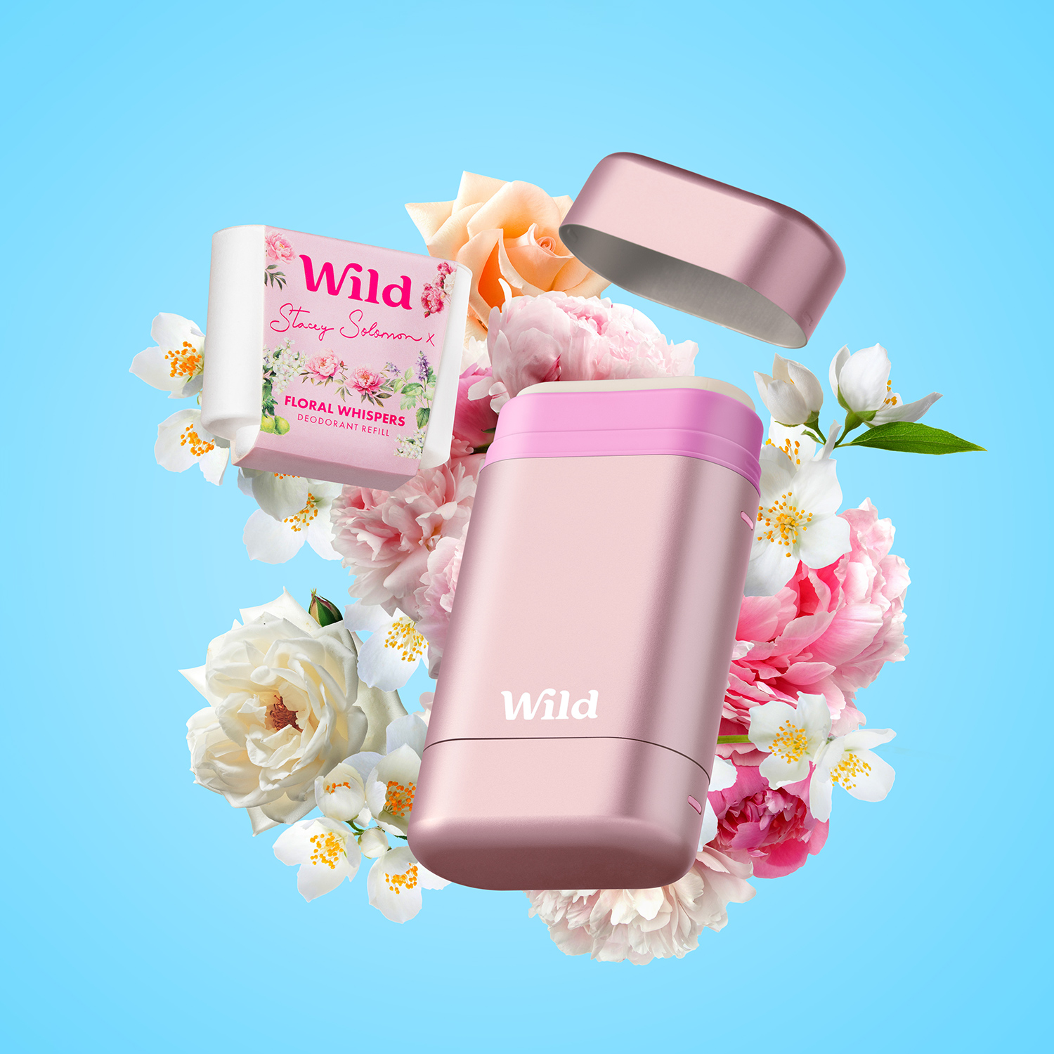 Caption: a couple of pink containers sitting on top of a bouquet of flowers