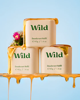 Caption: three containers of wild are stacked on top of each other