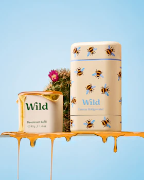 Caption: a can of wild honey sitting on top of a shelf