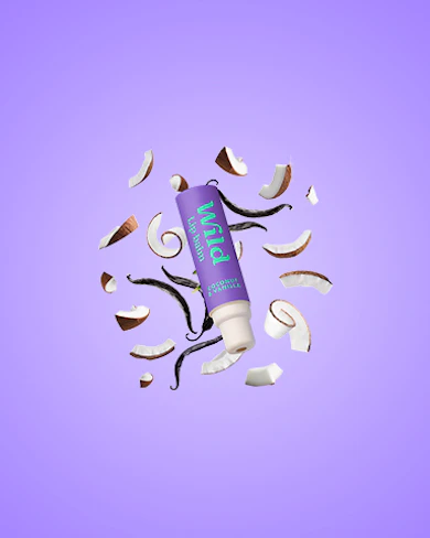 Caption: a tube of toothpaste surrounded by broken pieces of toothpaste