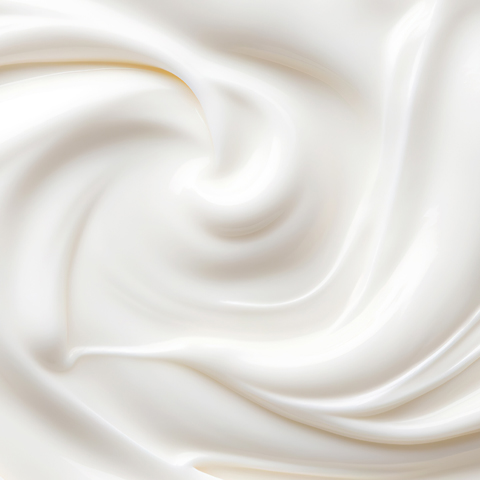 Légende : gros plan sur une texture de crème blanche