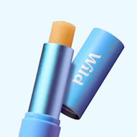 Caption: a close up of a blue tube of lipstick