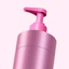 Caption: a pink bottle of lotion on a white background