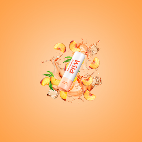 Caption: a bottle of fruit juice surrounded by oranges and lemons
