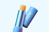 Caption: a close up of a blue tube of lipstick