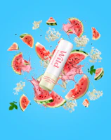 Caption: a tube of lip butter surrounded by watermelon slices