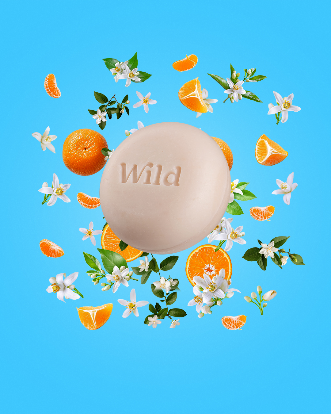 Légende : une barre de savon avec le mot sauvage entouré d'oranges et de fleurs