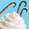 Caption: a cupcake with white frosting and chocolate sticks sticking out of it