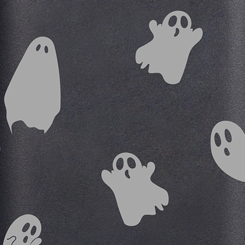 Caption: a group of ghost stickers on a black surface