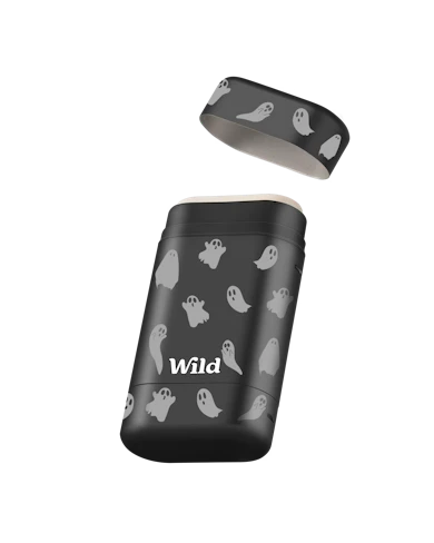 Caption: a black and white photo of a can of wild