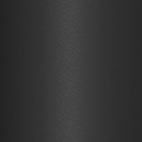 Légende : gros plan d'une surface métallique noire