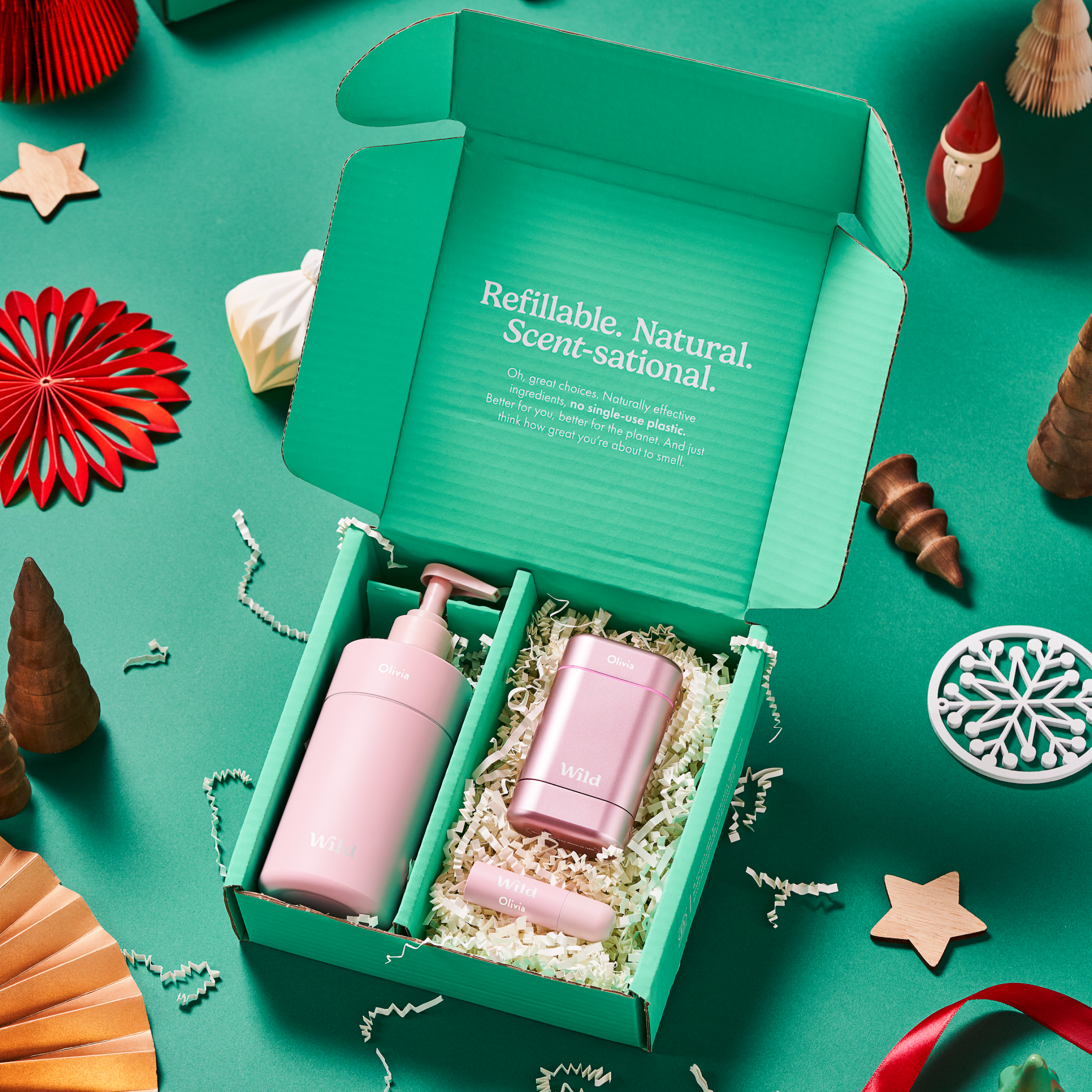 Caption: a green box with two pink bottles in it