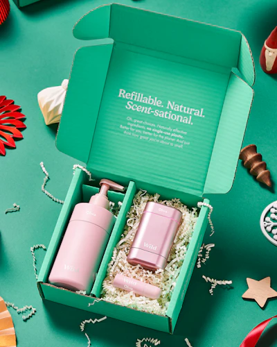 Caption: a green box with two pink bottles in it