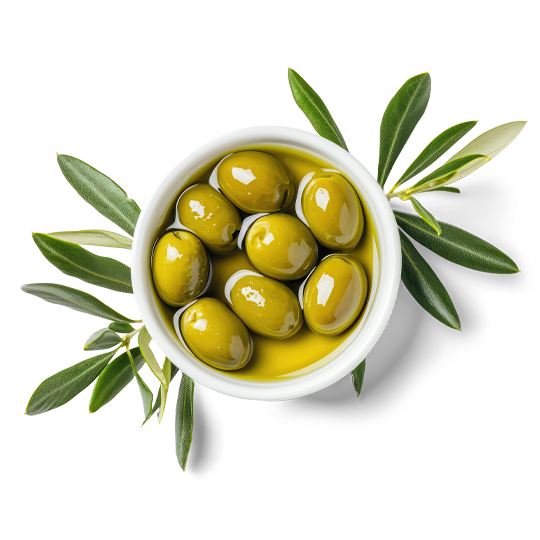 Caption: a white bowl filled with olives and green leaves