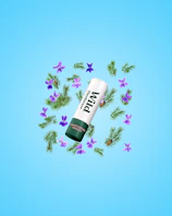 Caption: a tube of toothpaste surrounded by flowers on a blue background