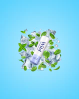 Caption: a tube of toothpaste surrounded by mint leaves