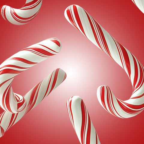 Légende : un motif de sucre d'orge rouge et blanc sur fond rouge