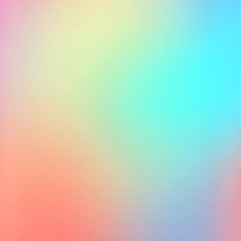 Caption: a blurry image of a rainbow colored background